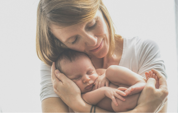 baby with mother